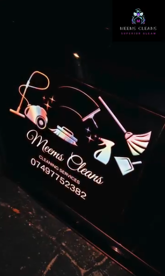 Meems Cleans branded signage with phone number